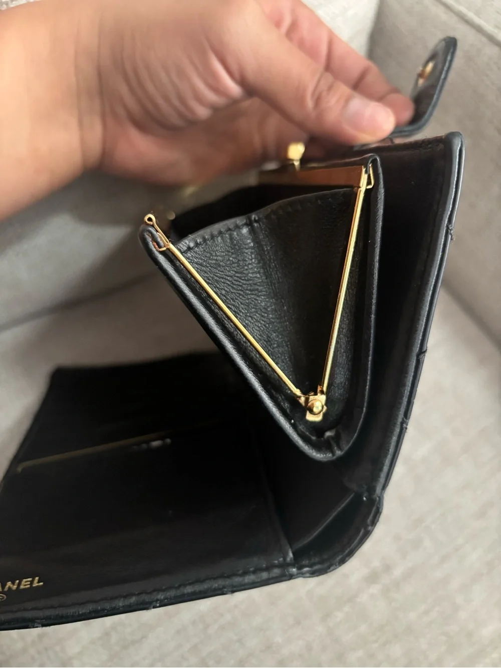 CHANEL Black Quilted Leather Wallet with Gold CC Snap